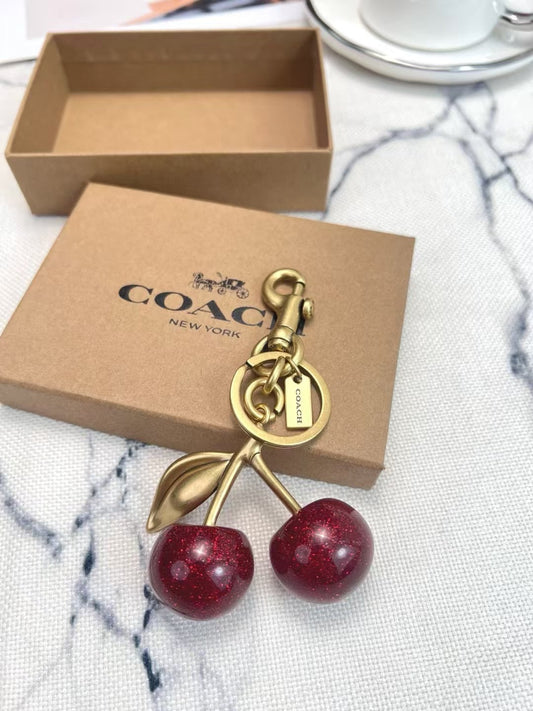 Coach cherry charm
